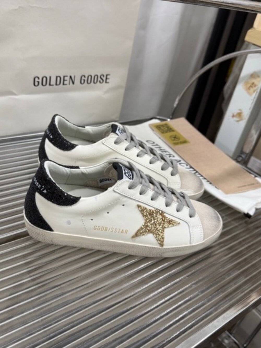 Golden Goose Women's White and Black Sneakers with Gold Star
